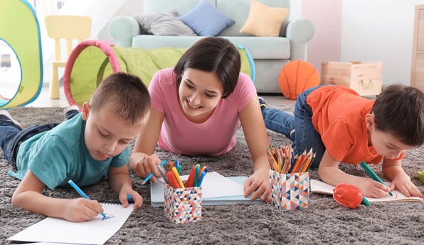 children and adult drawing
