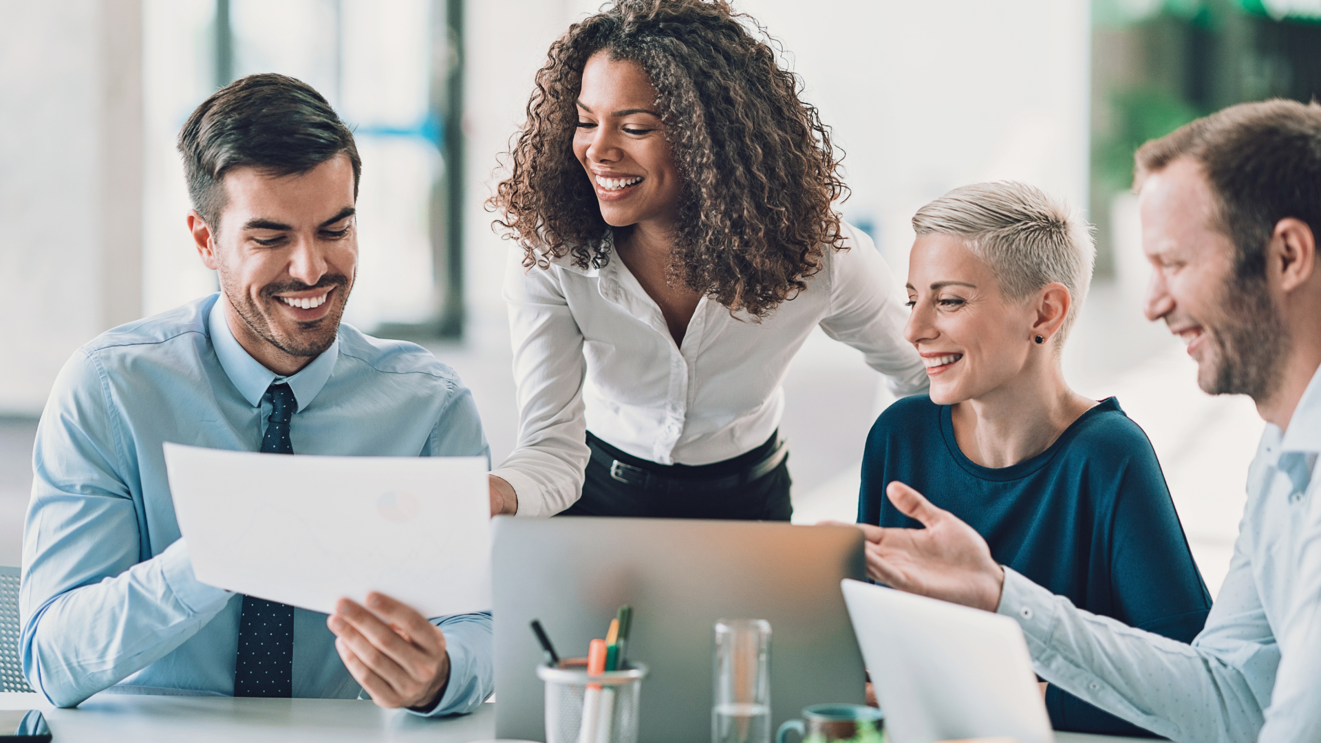 Team looking at report